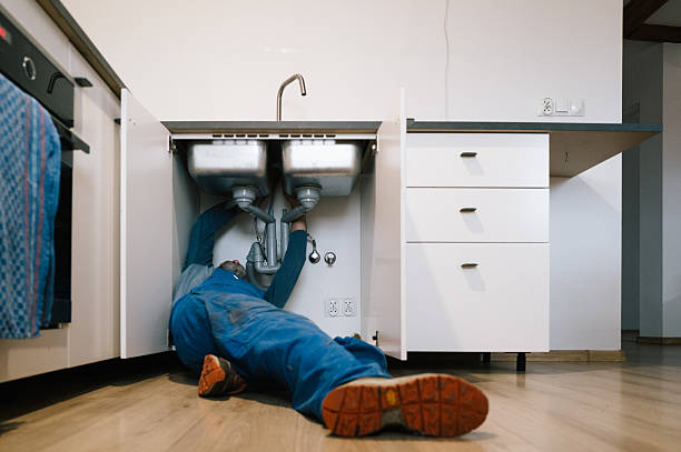 Professional Drain Cleaning technician working in Conway, FL
